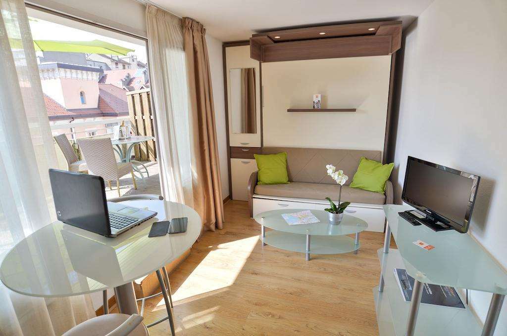 Apparthotel Privilodges Le Royal Annecy Ruang foto